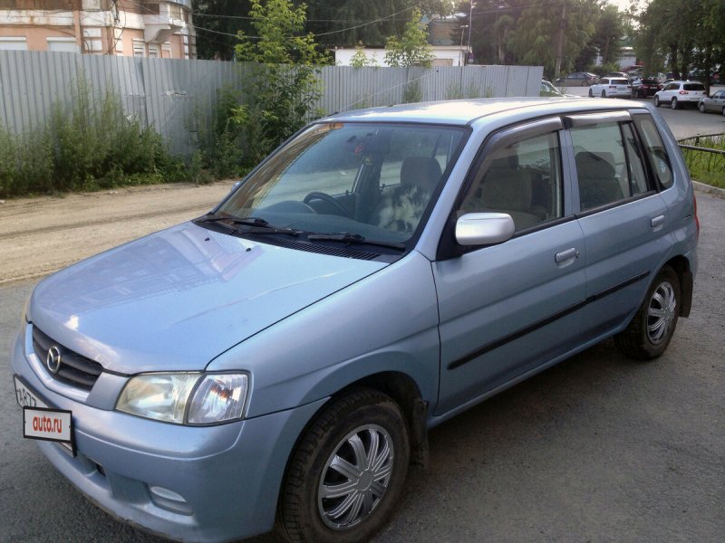 Мазда Демио 2003 желтые