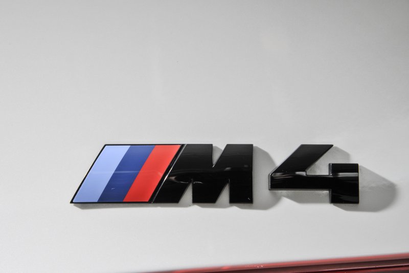 BMW 4 Competition шильдик