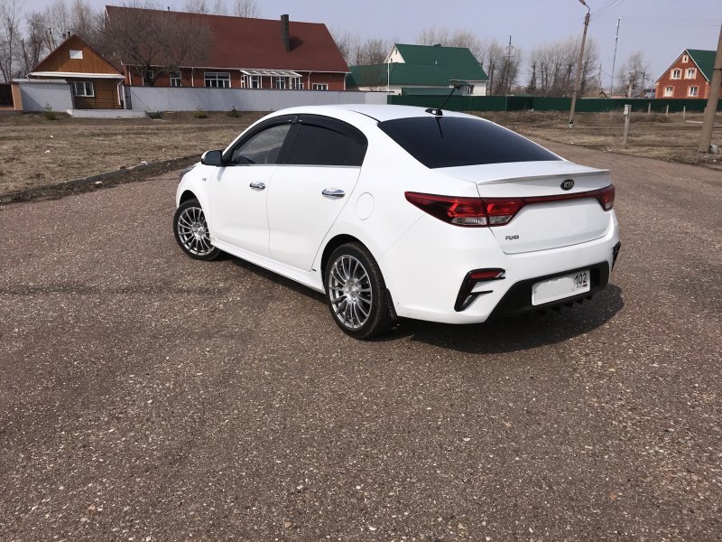 Киа Рио 4 белая тюнинг