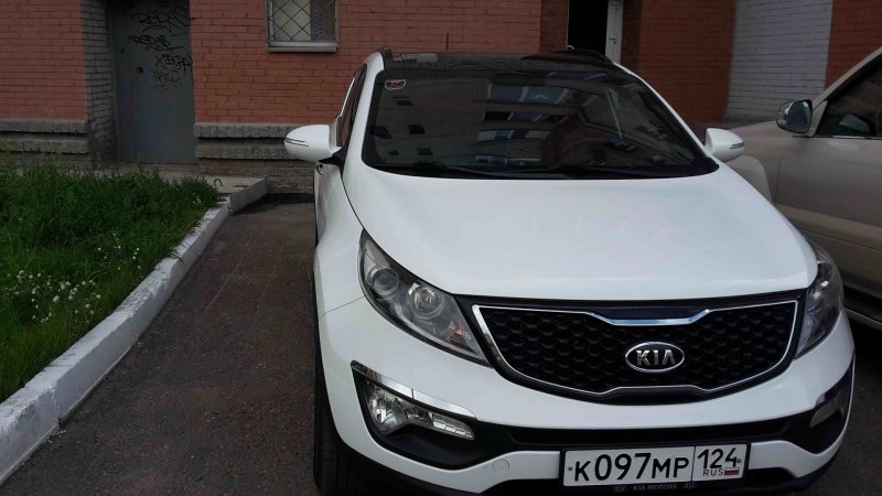 Kia Sportage 3 с черной крышей