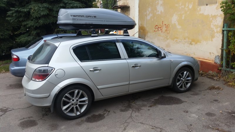 Подсветка багажника в Opel Astra j