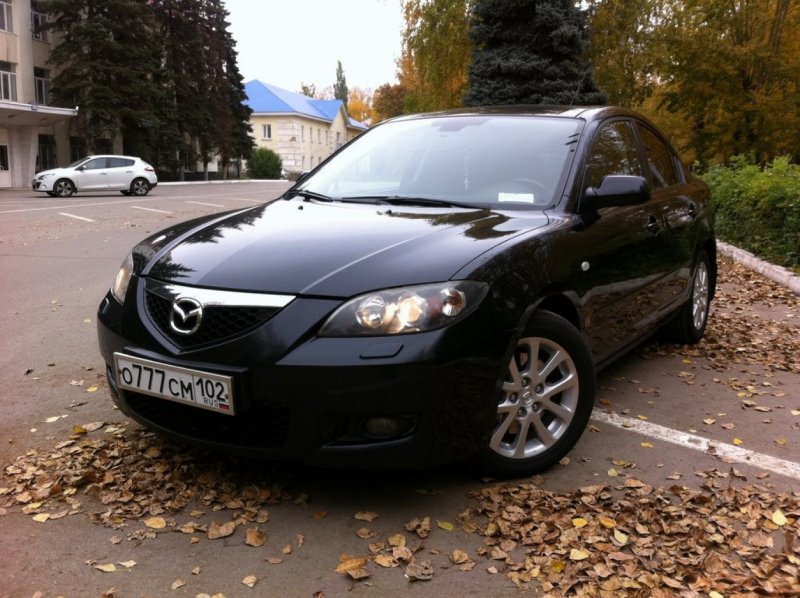 Марка машины Мазда чёрная