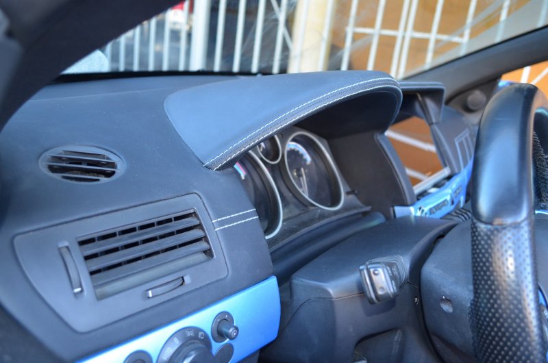 Opel Astra h перетяжка Торпедо
