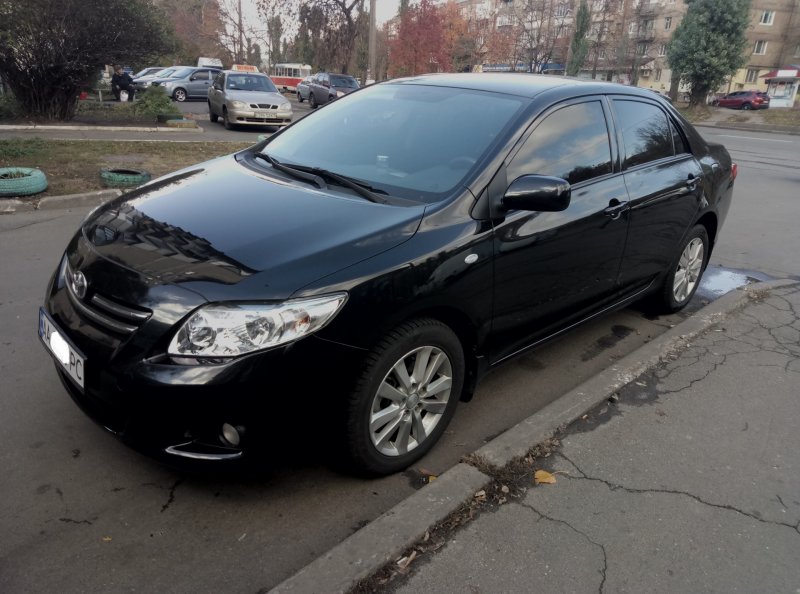 Тойота Королла 2012 года автомат черный