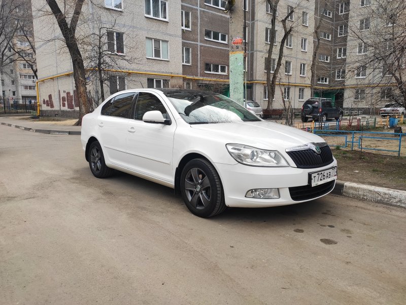 Шкода а7 мокрый асфальт