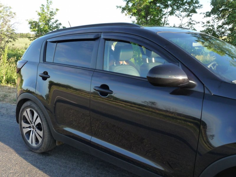 Kia Sportage 4 черный перламутр