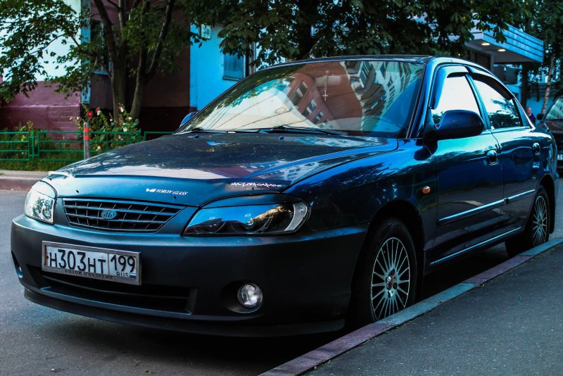 Kia Spectra 1 поколение