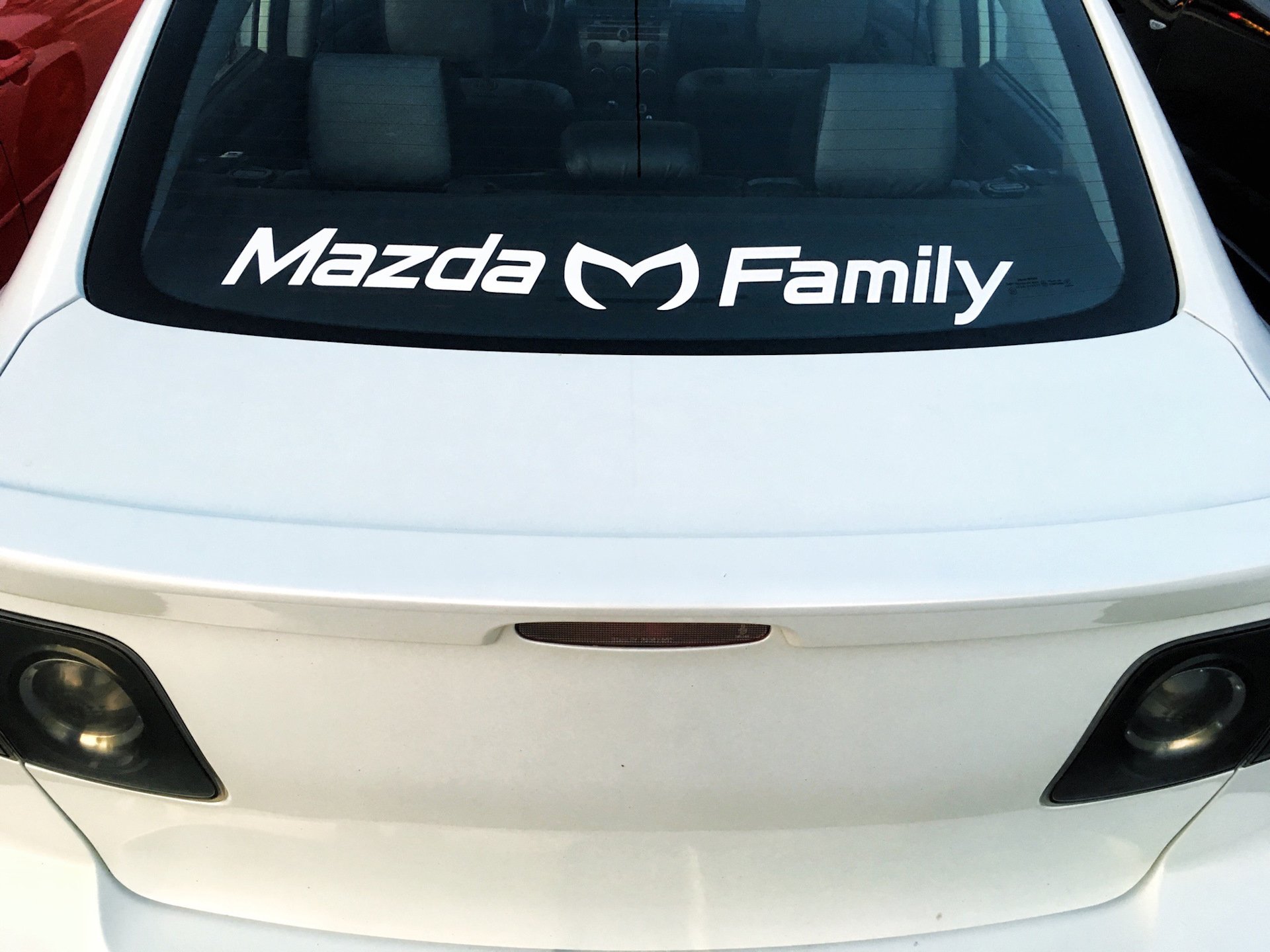 Mazda family. Мазда Фэмили. Мазда Family 99. Мазда Фэмили наклейка. Наклейки Мазда фамилия.