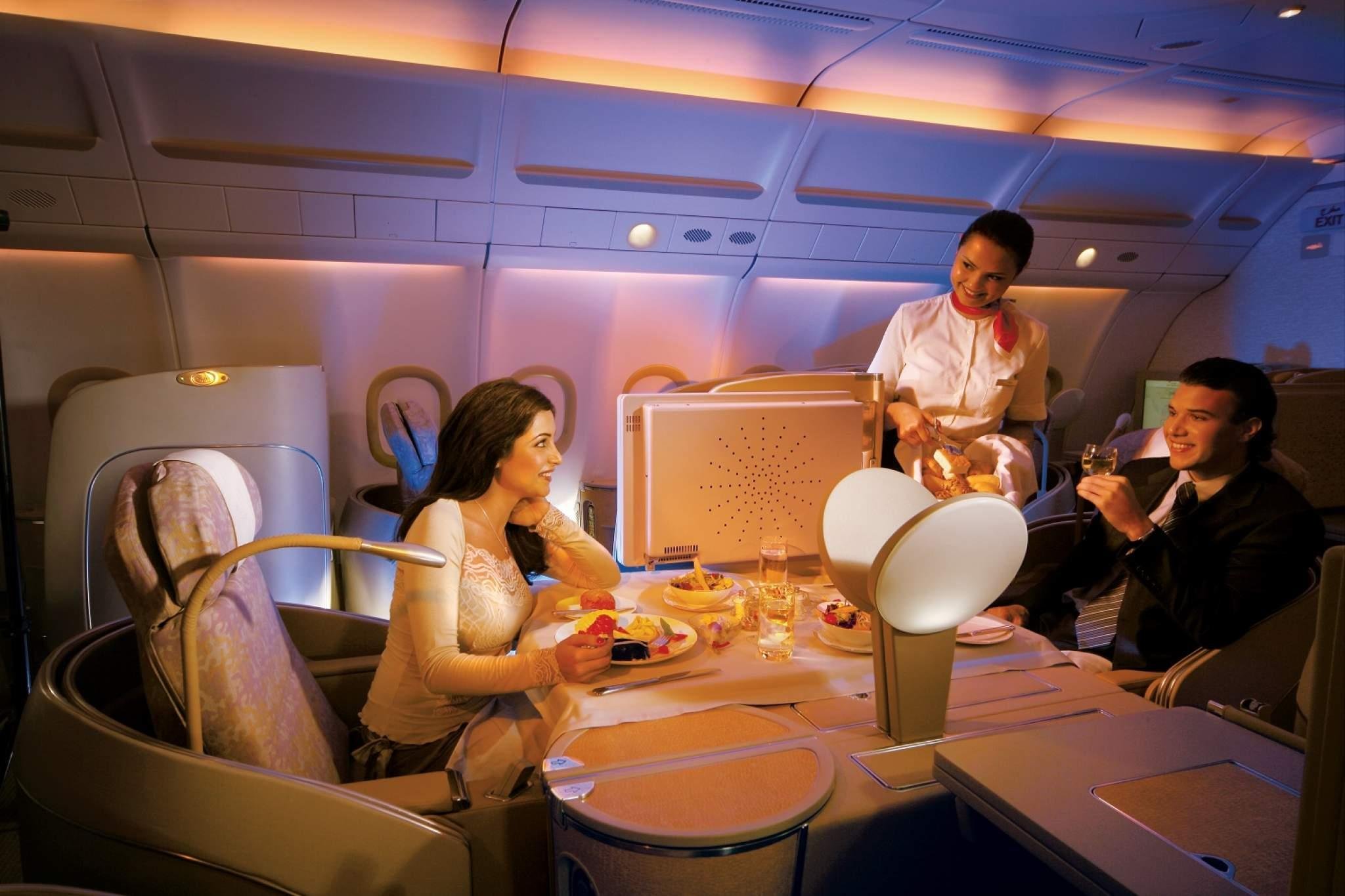 First class going first class. Самолет Etihad Airways 1 класс. Этихад резиденция самолёт. Мужчина и женщина в самолете. Девушка в частном самолете.