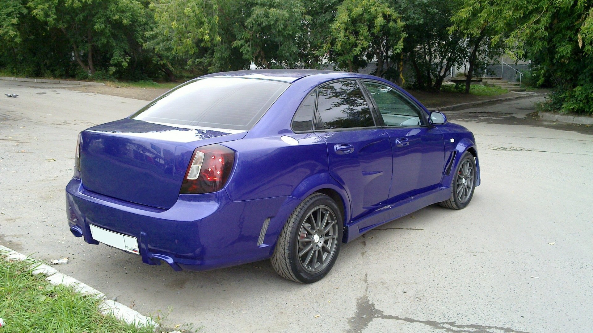 Тюнинг лачетти седан. Tuning Chevrolet Lacetti Blue. Chevrolet Lacetti синий. Lacetti Tuning 1.8 Chevrolet. Chevrolet Lacetti седан в обвесе.