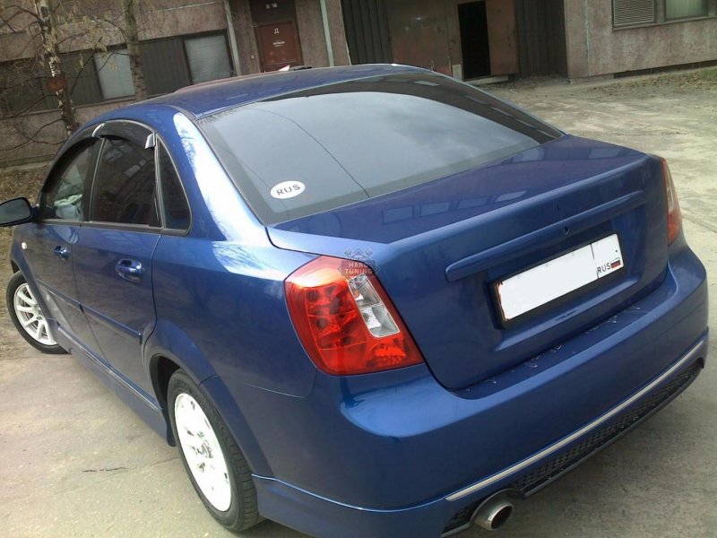 Бампер задний Chevrolet Lacetti седан