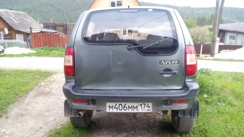 Кронштейн калитка запасного колеса Шевроле Нива