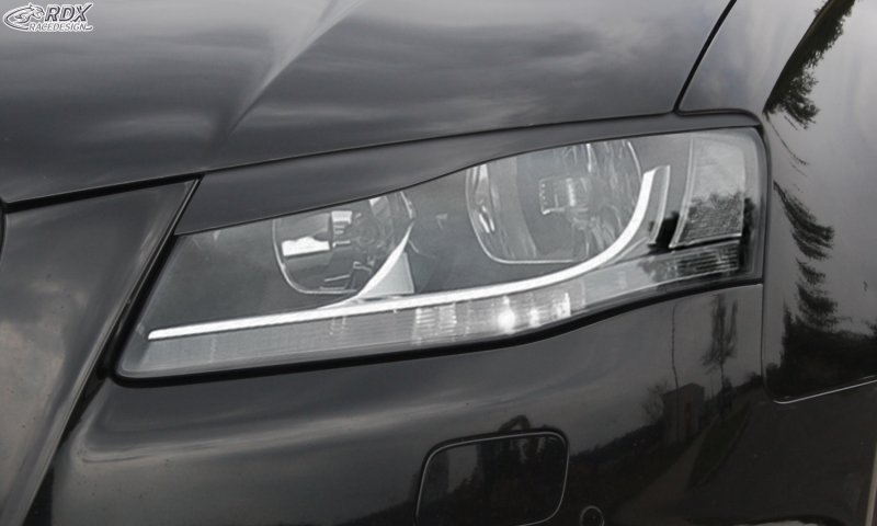 Накладки на передние фары Audi a4 2004-2007
