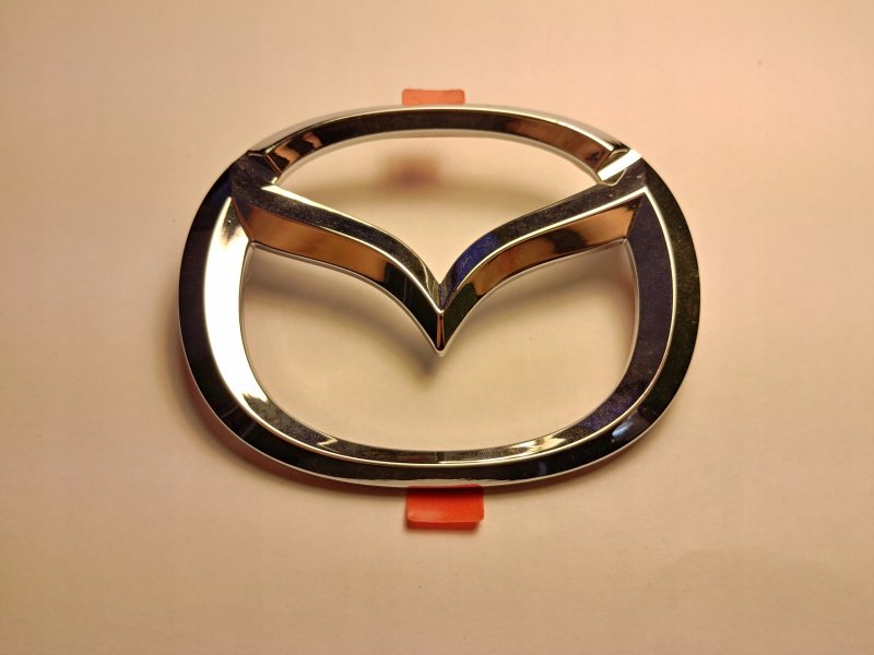 Эмблема Mazda арт. C2y151731