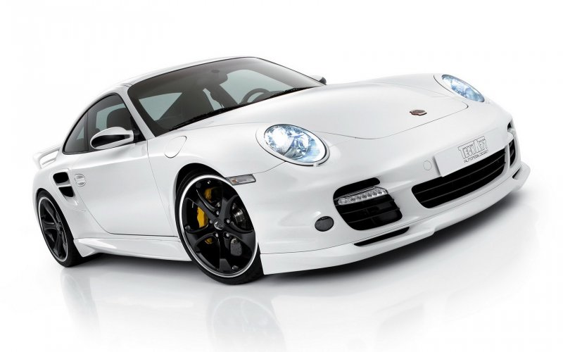 Машины марки Порше 911 спорт белый
