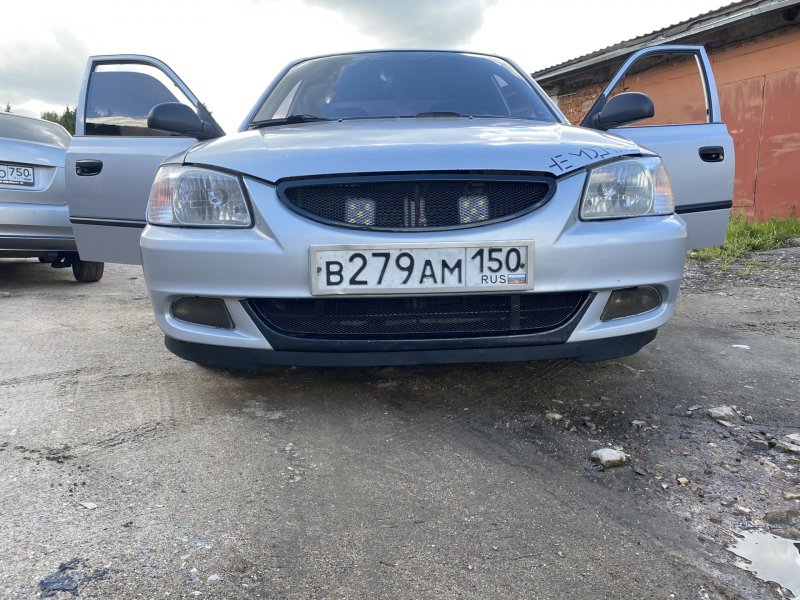 Синий Chevrolet Lacetti с обвесом