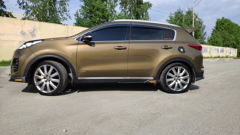 Белые диски на Kia Sportage 4