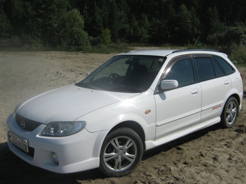 Mazda 323 2000 салон