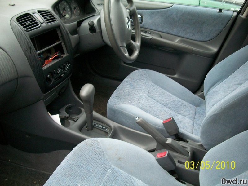 Мазда фамилия 2002 фото салона