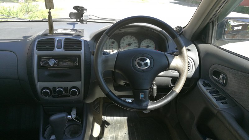 Mazda familia 1998 салон