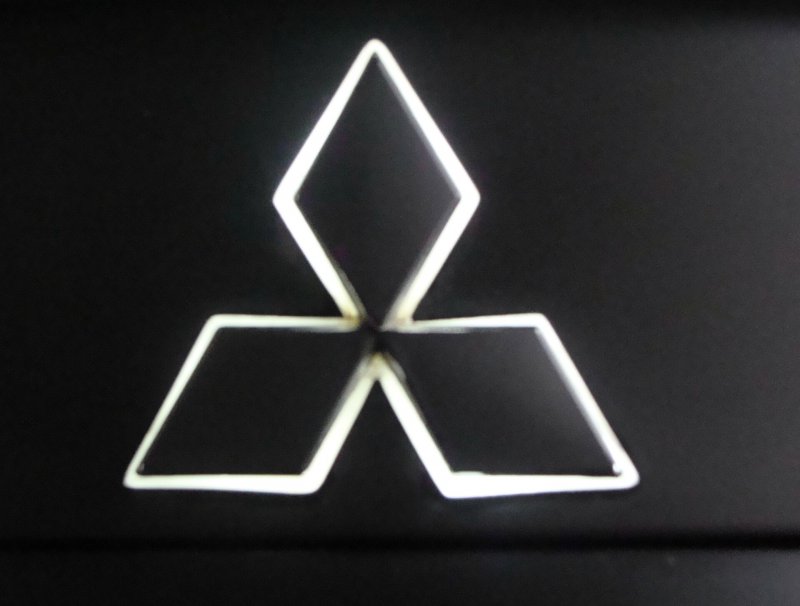 Знак Митсубиси