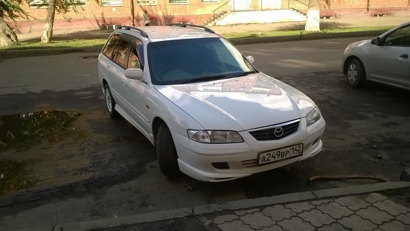 Черная Мазда капелла матовая