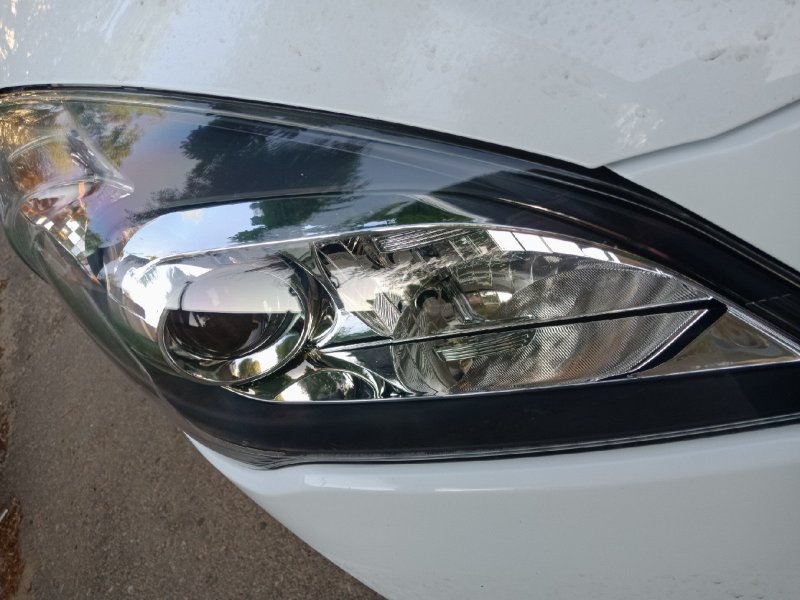 Стекло фары Kia Ceed 2010