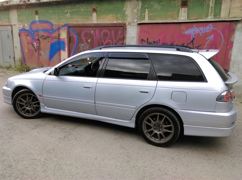 Тойота Калдина gt-t st215