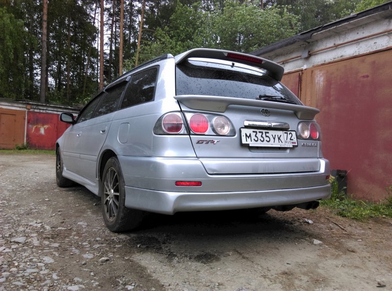 Тойота Калдина gt-t st215