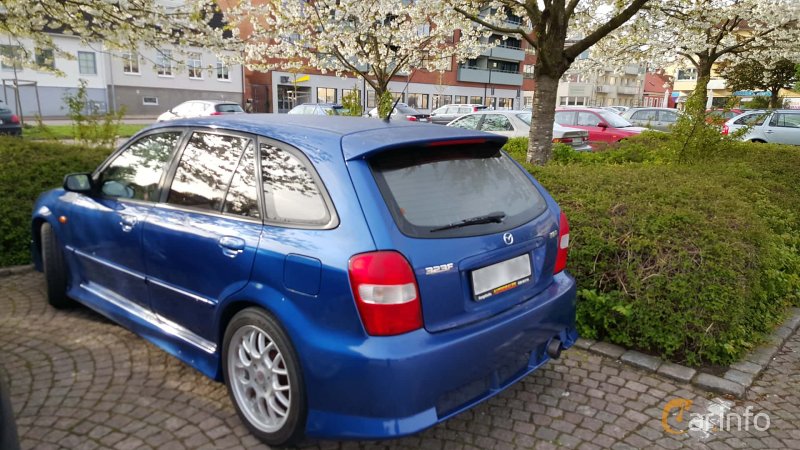 Задняя полка Mazda 323