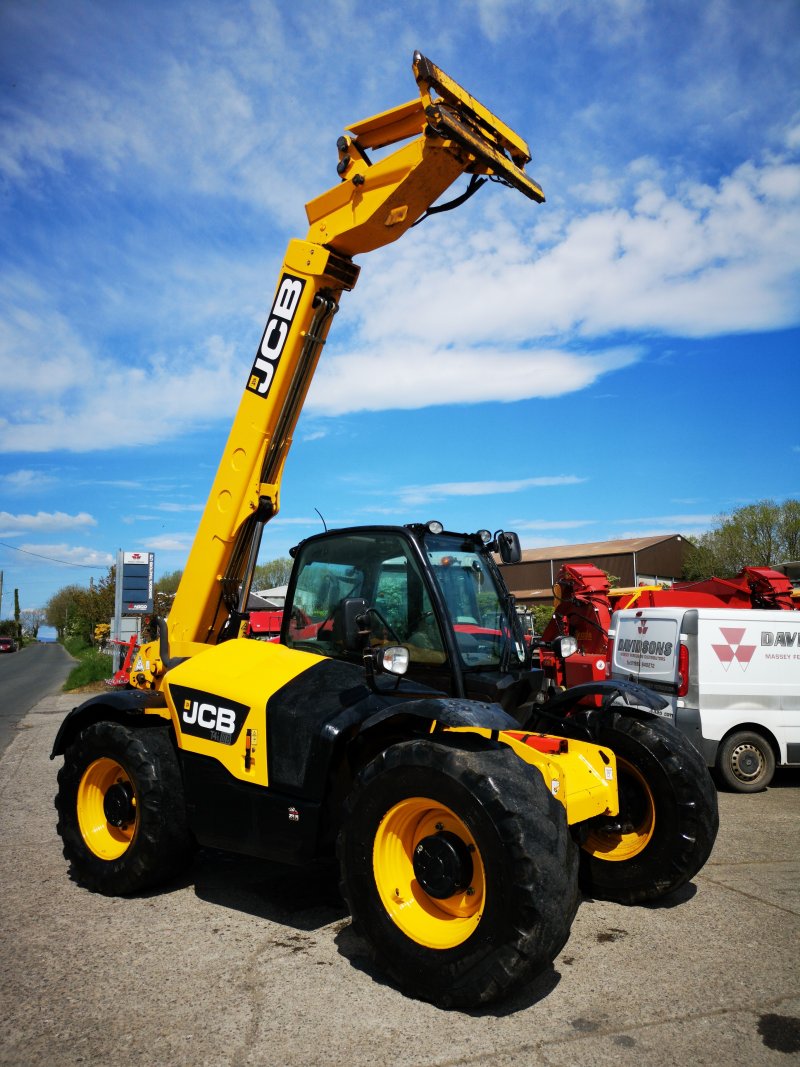 Экскаватор-погрузчик New Holland b110b