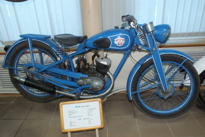 Корова на мотоцикле