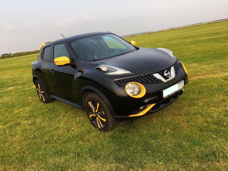 Ниссан Жук желтый 2014