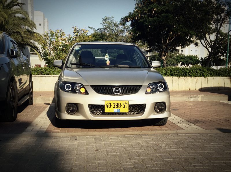 Тюнингованная Mazda familia
