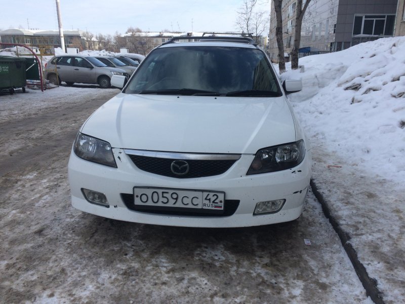 Мазда фамилия с вагон 2002 фара