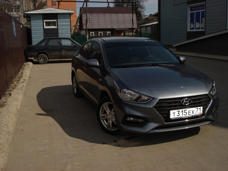 Hyundai Solaris 2012 sedan мокрый асфальт