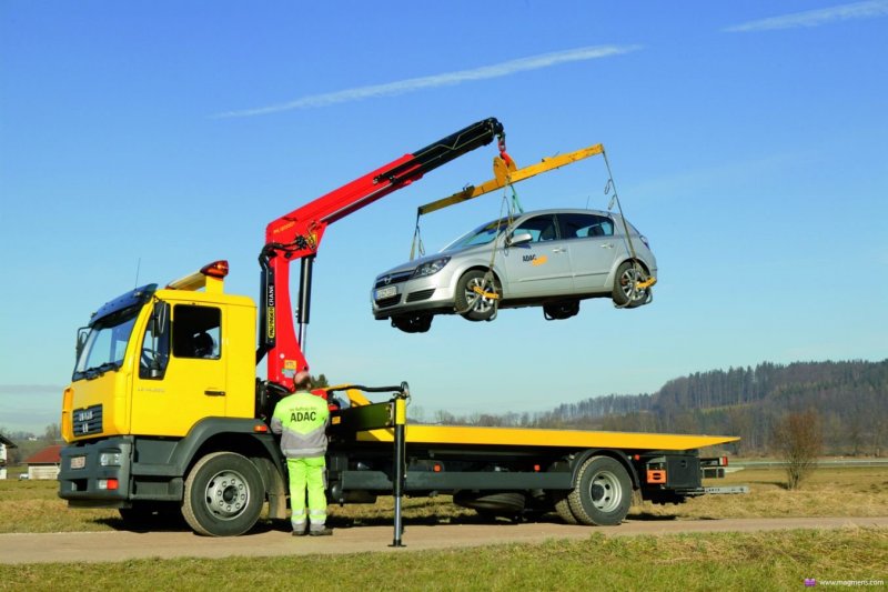 Автоэвакуатор с КМУ 3034vu
