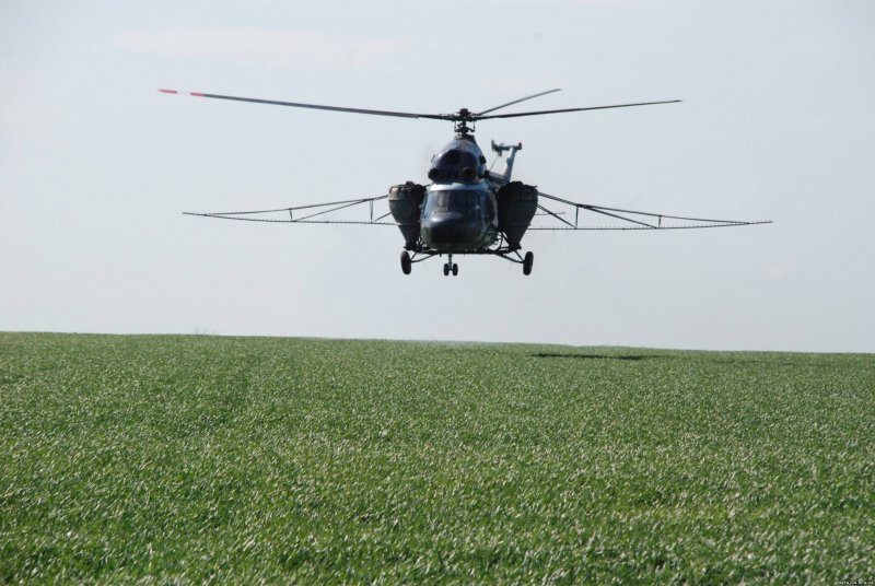 Вертолет в сельском хозяйстве