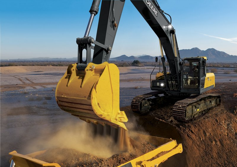 Экскаватор-погрузчик John Deere 325sl.