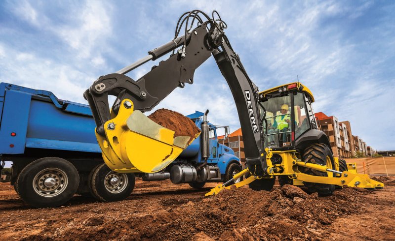 Экскаватор-погрузчик John Deere 325sl.